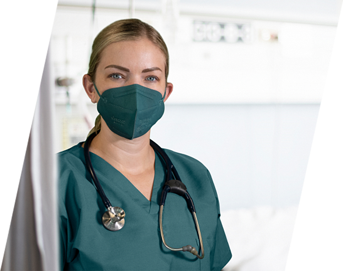 Nurse In Green Scrubs Wearing ViraCoat Face Mask