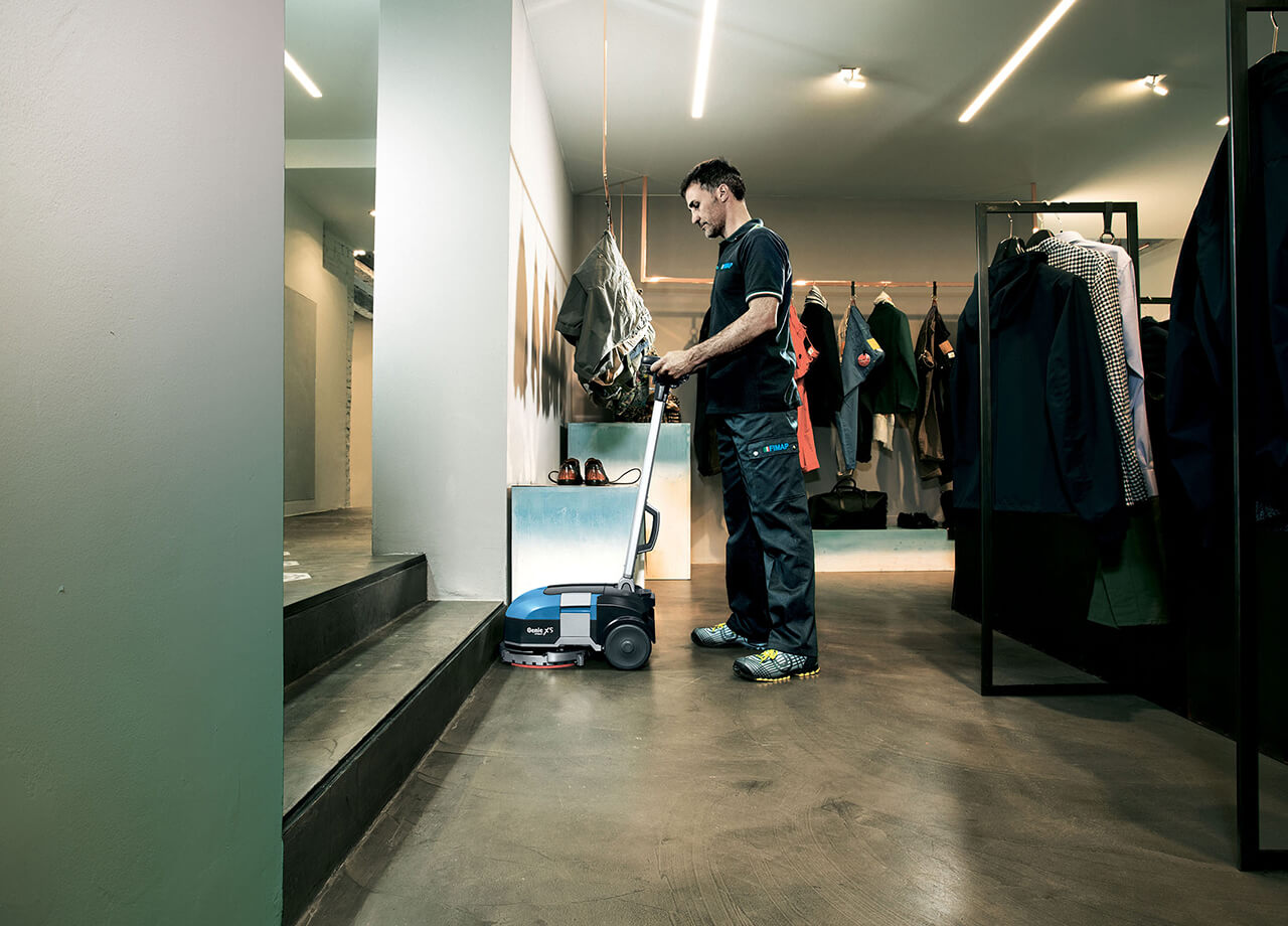 Cleaning A Shop Floor With The Genie XS Floor Cleaning Machine